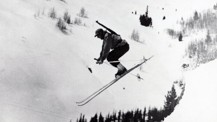 solider in winter uniform in ski jump