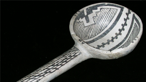 earthenware spoon with black and white designs