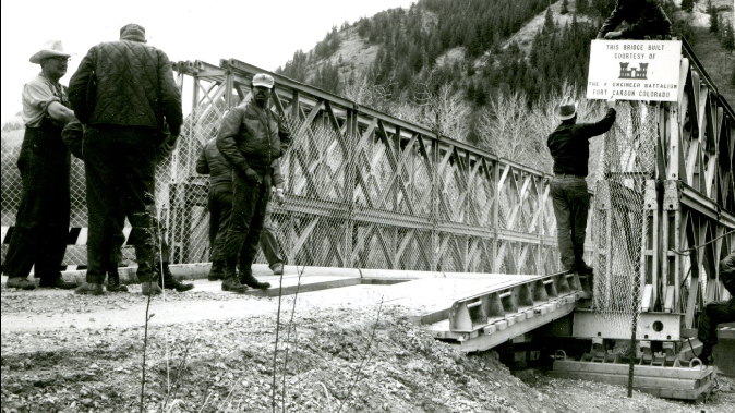men working on a bridge
