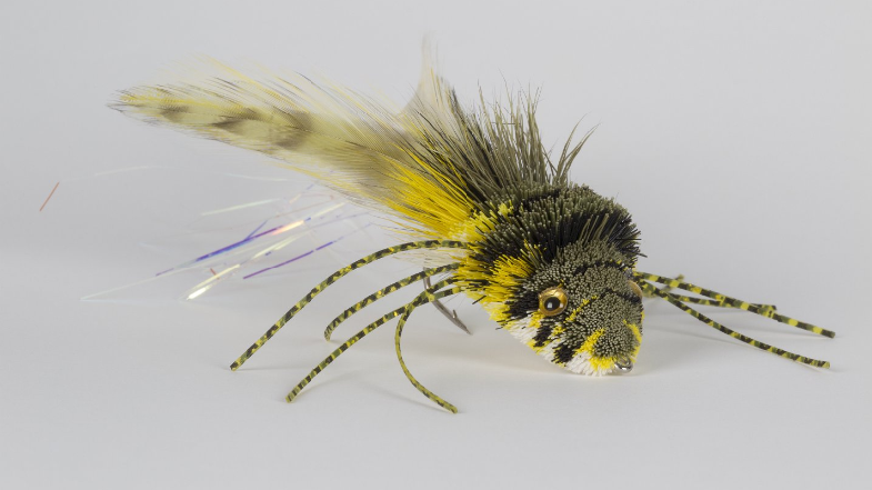 yellow and black fishing fly lure